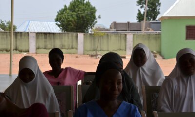 Volunteer staff under the pavilion at Damare PHC sat Picsart AiImageEnhancer scaled.jpg